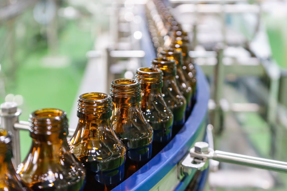 Printing on glass bottles using MapleJet Inkjet Printer